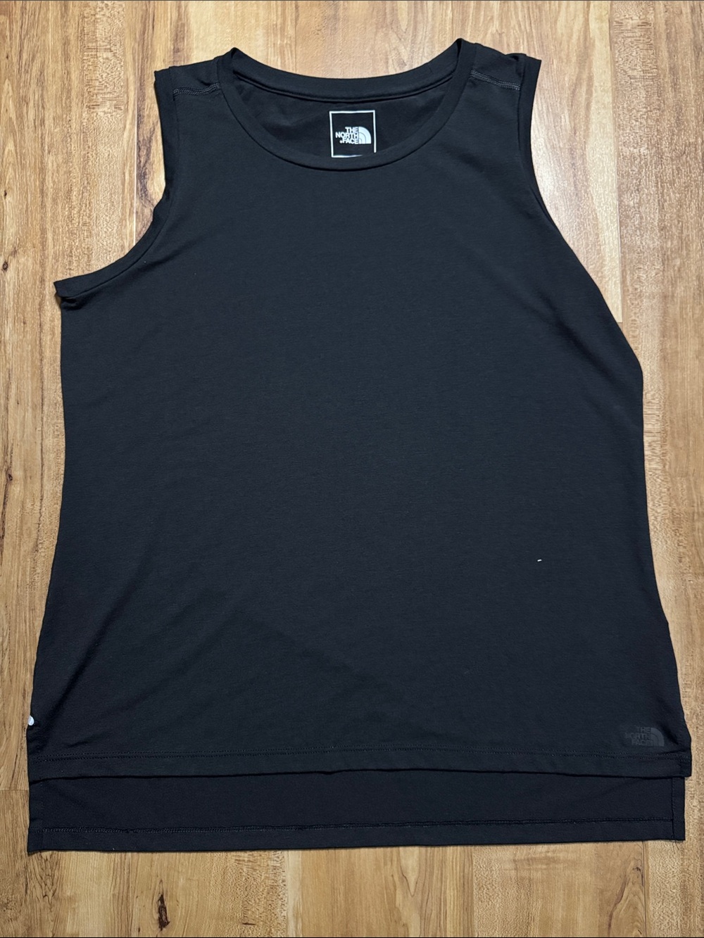 The North Face tank size large.